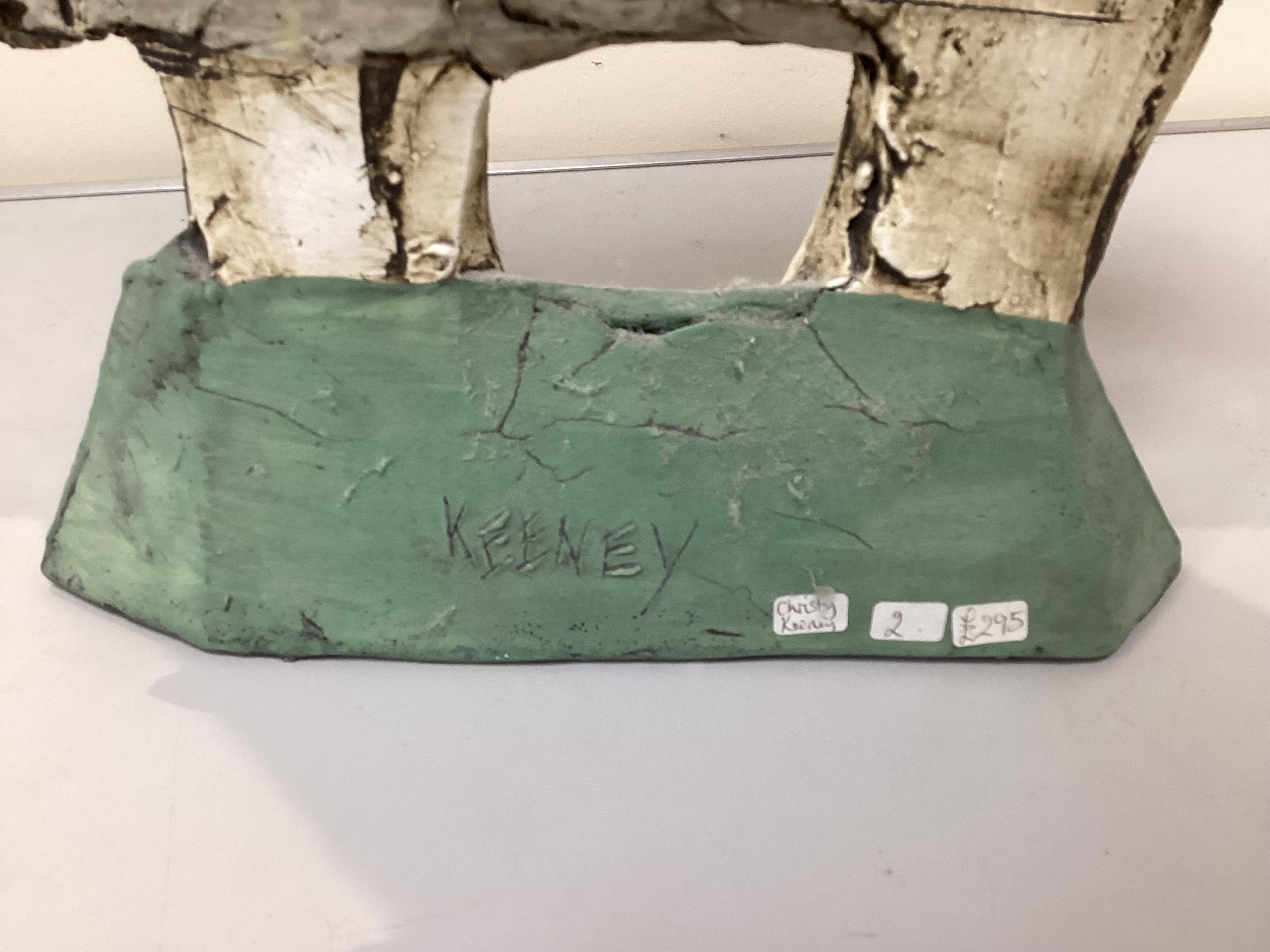 Christy Keeney (b.1958) Figure of a accordian player, 42.5cm high